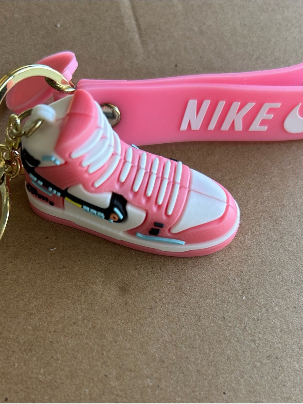 Nike Kids Pink & White Sneaker Keychain with Gold Ring